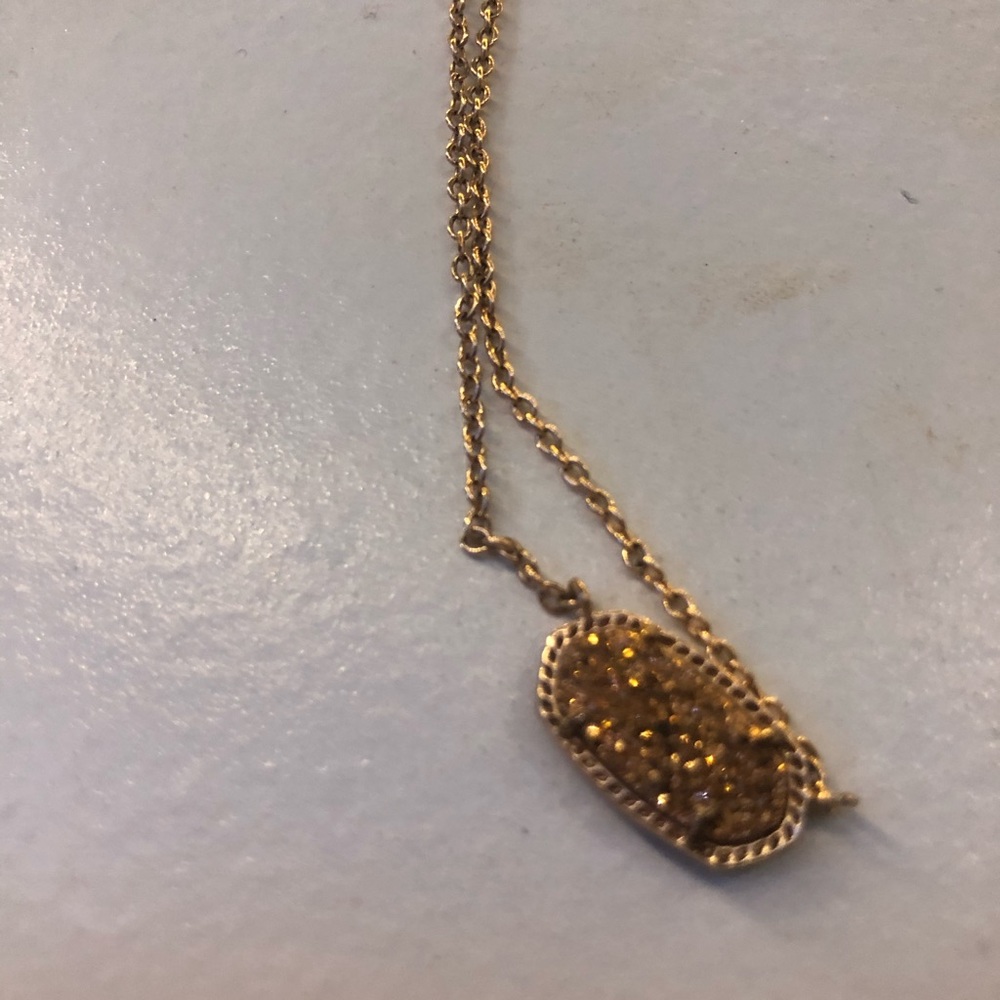 very beautiful gold sparkly kendra scott